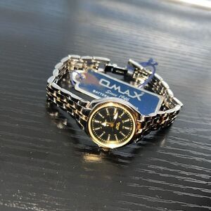 OMAX stainless steel small face unisex watch.